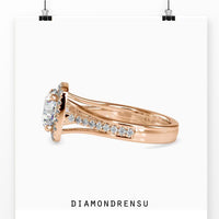 Round cut diamond ring with a timeless split shank design.