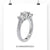 Lab grown diamond three stone engagement ring with trellis setting.