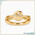 Round brilliant cut diamond ring in a 4 prong round engagement ring setting with a unique design.