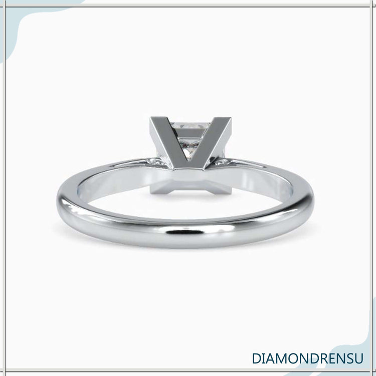 Beautiful prong setting engagement ring with a princess cut diamond and cathedral style.