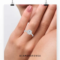 Round diamond ring with a brilliant cut and halo for added sparkle.
