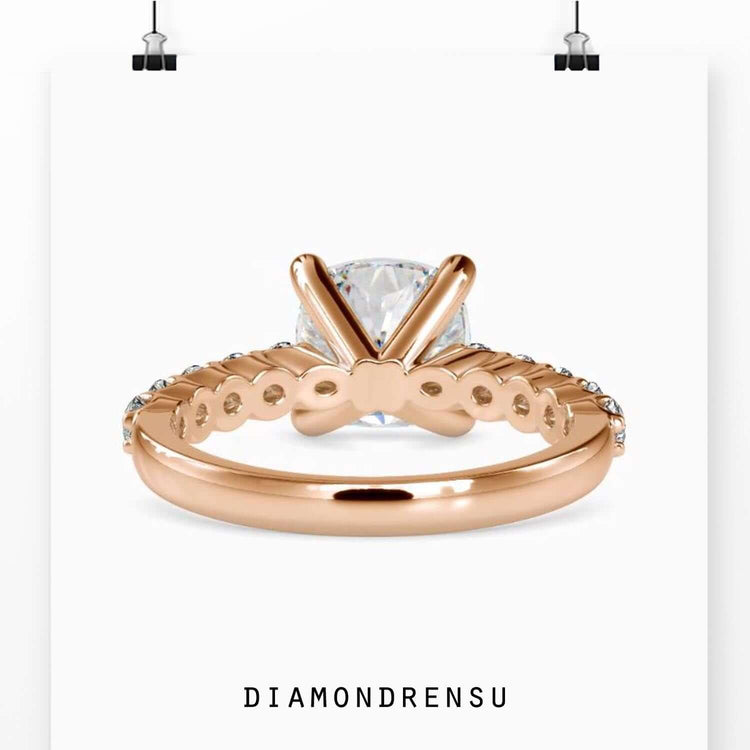 Handmade lab grown diamond ring in rose gold with 4 prong diamond setting