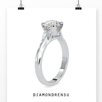 Round cut diamond ring with an elegant 4 prong setting.