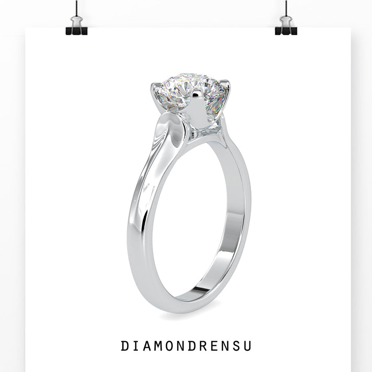 Round cut diamond ring with an elegant 4 prong setting.