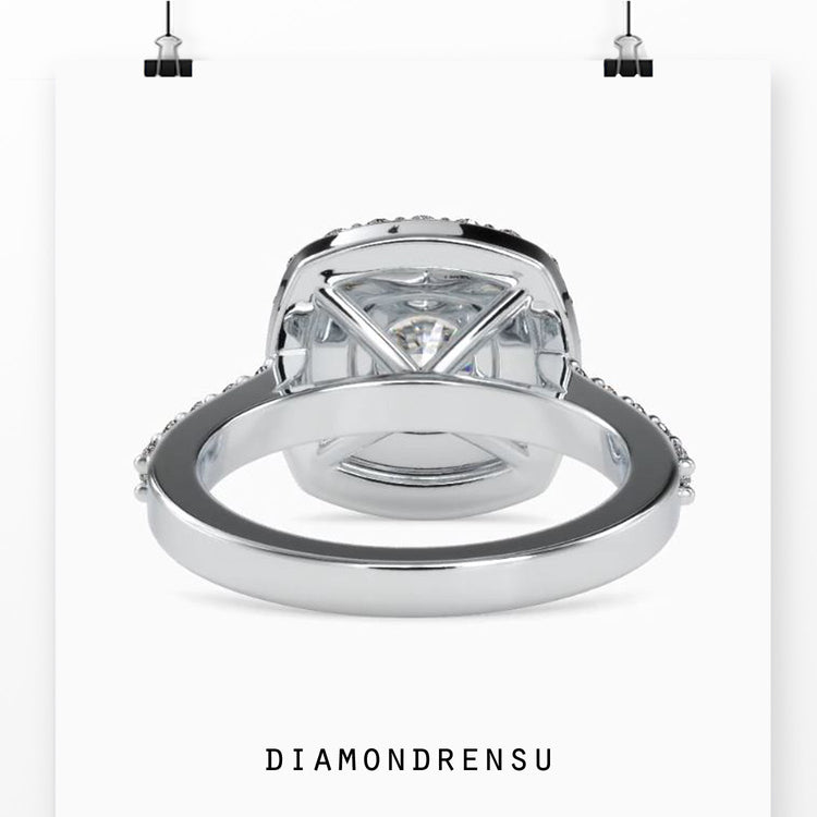 Double halo engagement ring with a radiant round diamond.