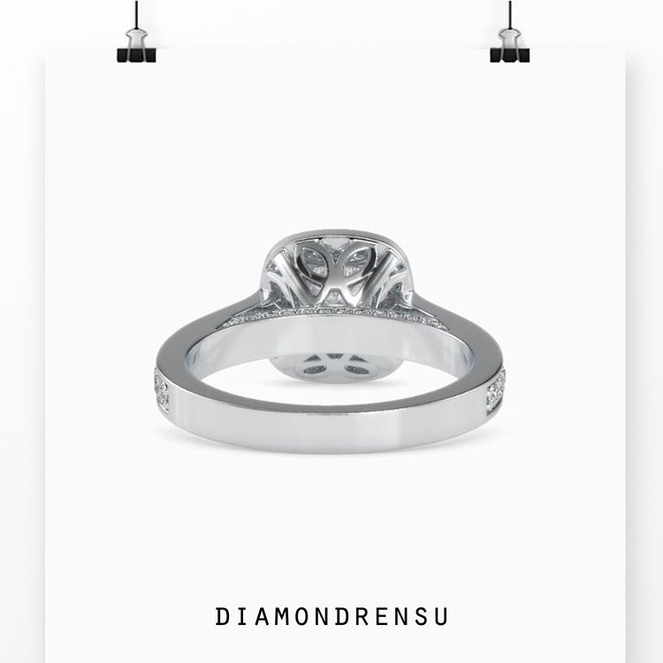 Stunning pave engagement ring with a classic 4 prong diamond ring setting.