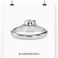Round brilliant diamond ring with a secure prong setting.