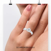 2 carat round cut diamond ring offering bold brilliance and charm.