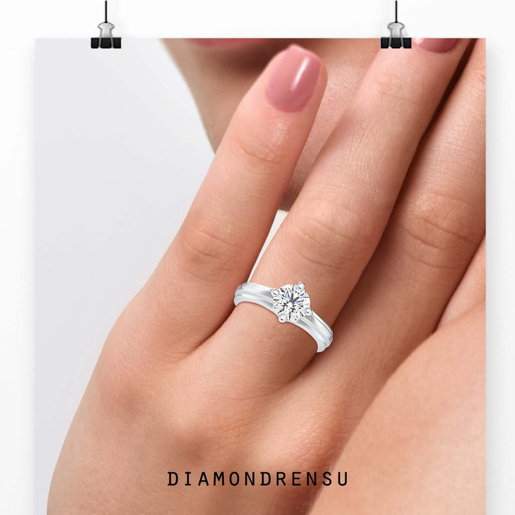 2 carat round cut diamond ring offering bold brilliance and charm.