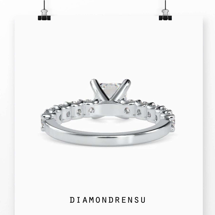 Classic 4 prong engagement ring with a princess cut diamond for timeless elegance.