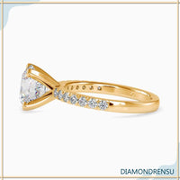 Pave engagement ring with a round brilliant cut diamond for modern beauty.
