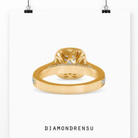 Timeless round brilliant cut diamond ring with a delicate prong setting.
