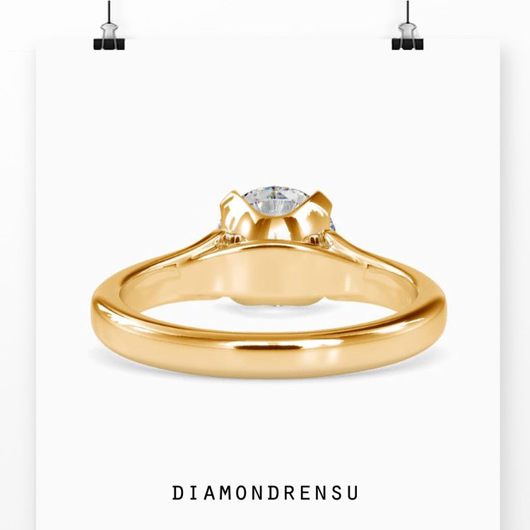 Round solitaire engagement ring for timeless beauty and elegance.