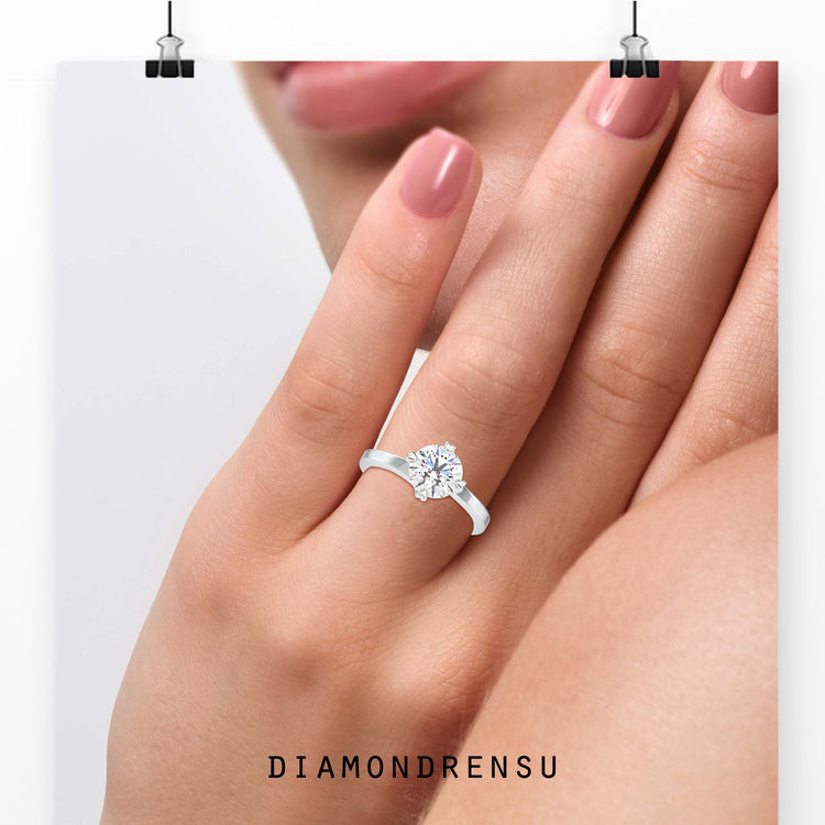 Round diamond ring featuring a brilliant solitaire diamond for added sparkle.