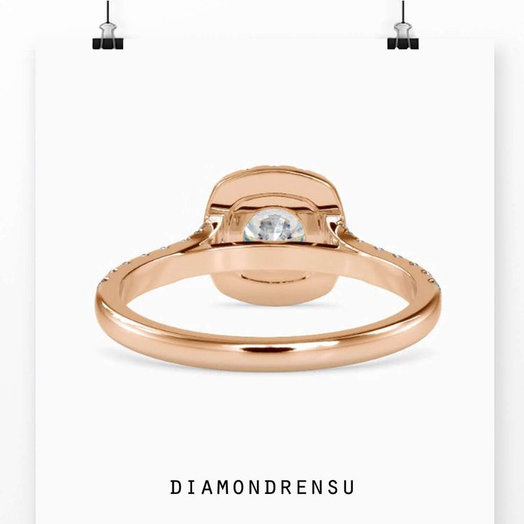 4 prong diamond ring with a round cut and elegant halo design.