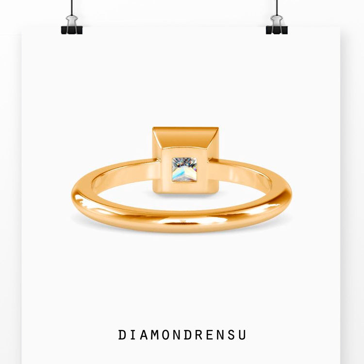 Elegant bezel set princess cut engagement ring for a timeless look.