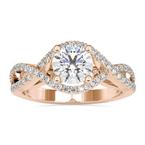 Round diamond engagement ring with a 2 carat round diamond in a twisted solitaire design.