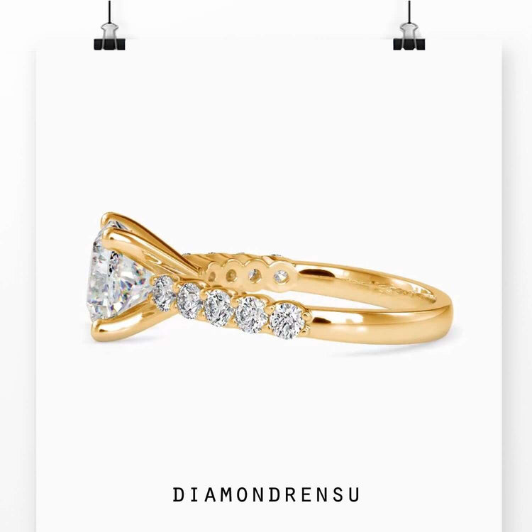 Oval diamond ring in a halo engagement ring setting, handmade jewelry