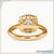 Handmade jewelry with a round brilliant cut halo engagement ring.