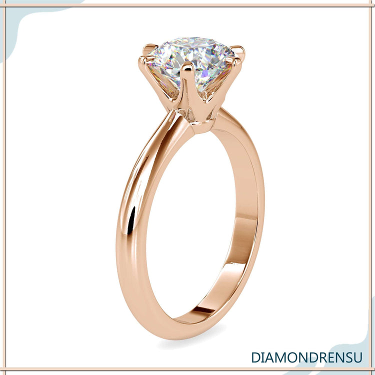6 prong round engagement ring featuring brilliant sparkle and secure setting.