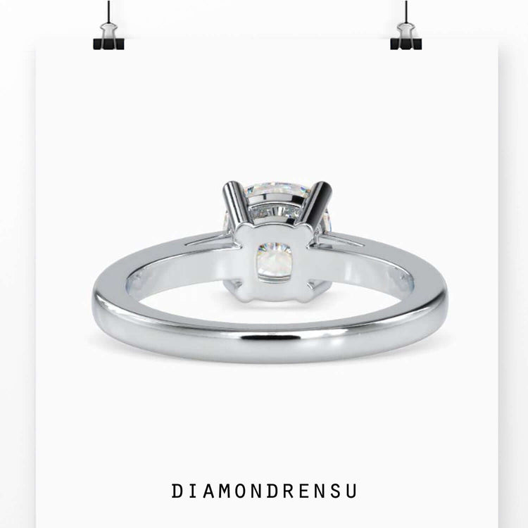 Diamond ring solitaire showcasing brilliance in a timeless cushion cut design.