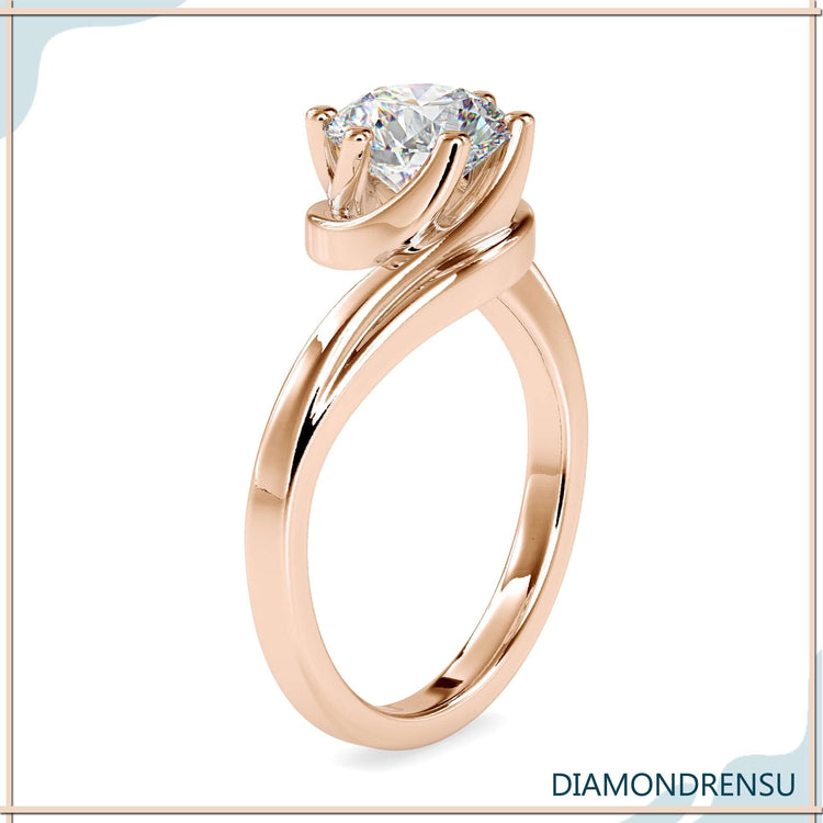 Stunning 6 prong engagement ring with a bypass design for maximum
sparkle.