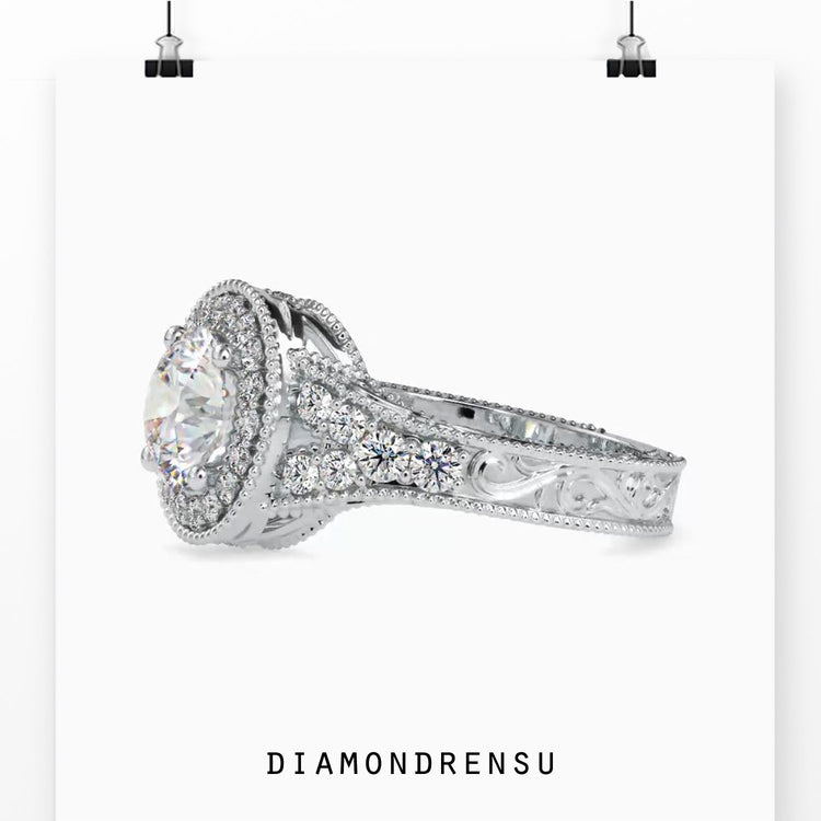 Halo diamond engagement ring featuring a stunning split shank design.