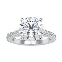 Round diamond engagement ring with a cathedral setting and 2 carat round diamond.