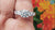 1.71 TCW Round Heart and Arrows Colorless Moissanite Three Stone Ring