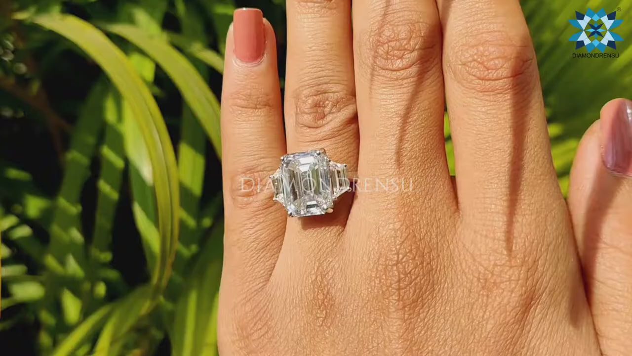 Trapezoid Emerald Step Cut Cathedral set Three Stone Engagement Ring
