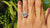 Trapezoid Emerald Step Cut Cathedral set Three Stone Engagement Ring