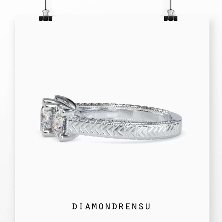 2 carat radiant cut diamond ring with prong setting in white gold.