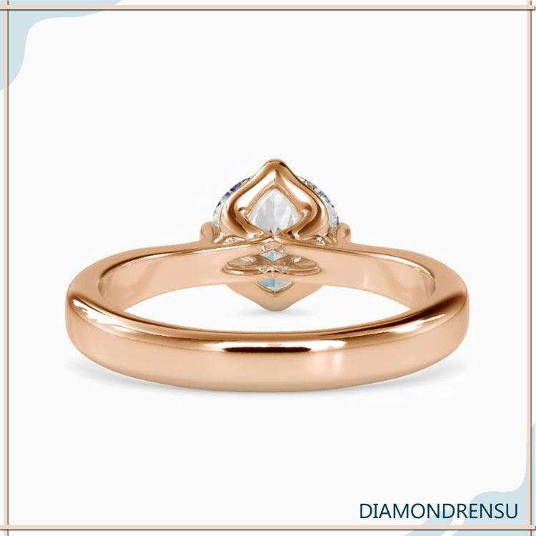 1 carat round diamond ring with side stones for added sparkle.