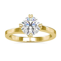 Round diamond engagement ring with a stunning 2 ct round diamond center.