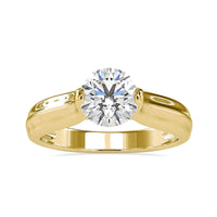 Tension Set Engagement Ring with a round solitaire diamond.