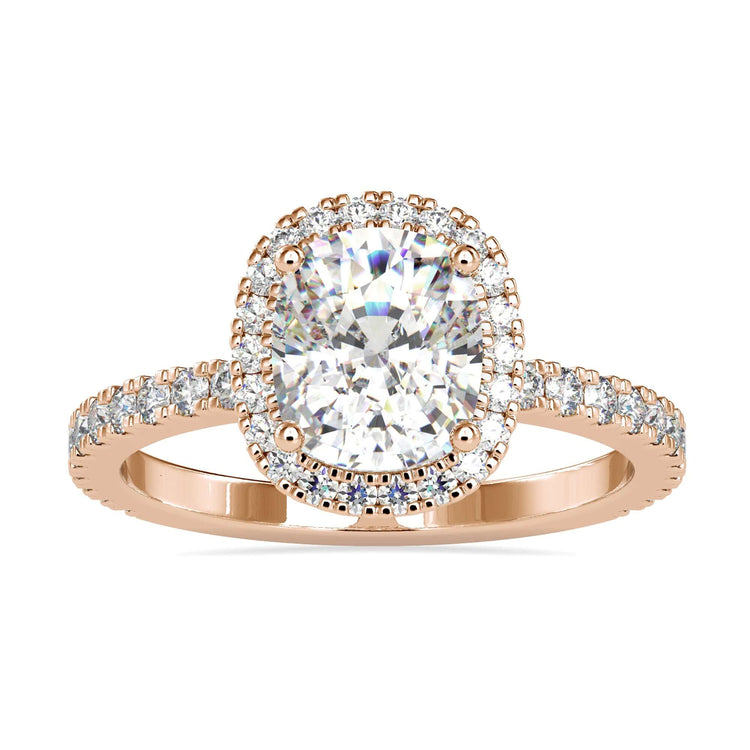 Rose gold, white gold, yellow gold ring with a cushion halo design.