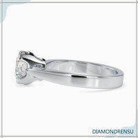 White Gold ring with round diamond and lab grown stone.
