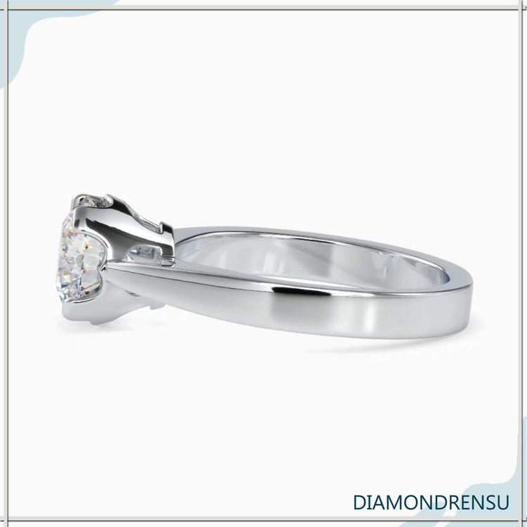White Gold ring with round diamond and lab grown stone.