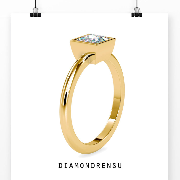 Dazzling 2 ct princess cut ring in a handmade bezel setting.