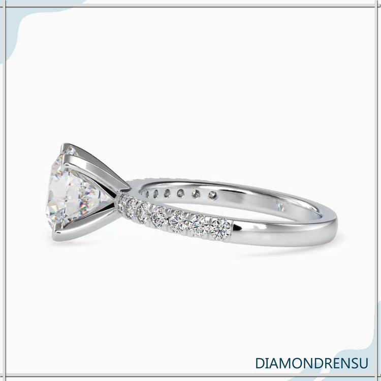 Rose gold, white gold, yellow gold ring featuring a round brilliant diamond.