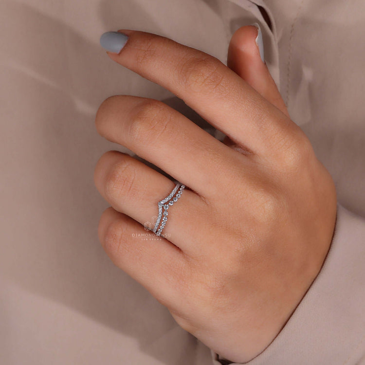 Round Eternity Band with diamonds on a hand