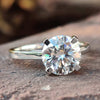 Cathedral Setting Round Brilliant Cut Solitaire Moissanite Engagement Ring