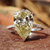 Unique 5.16 TCW Pear Cut Hidden Halo Pave Set Moissanite Engagement Ring