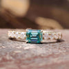 0.82 TCW Cyan Blue Emerald Moissanite Pavé Set East To West Ring