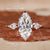 A woman's hand adorned with a unique and captivating diamond ring.