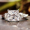 Princess Cut Moissanite Twisted Pavé Shank Three Stone Ring 2.1 CT