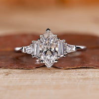Marquise engagement ring with 5 stone diamond ring.
