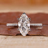 Marquise diamond ring crafted in white gold with a handmade finish.
