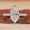 Hidden halo engagement ring with Dutch marquise diamond engagement ring style.

