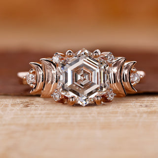 vintage engagement ring with round diamond side stone.
